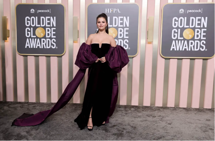 Selena Gomez Wears a Strapless Purple Valentino Dress at the Golden Globes 2023